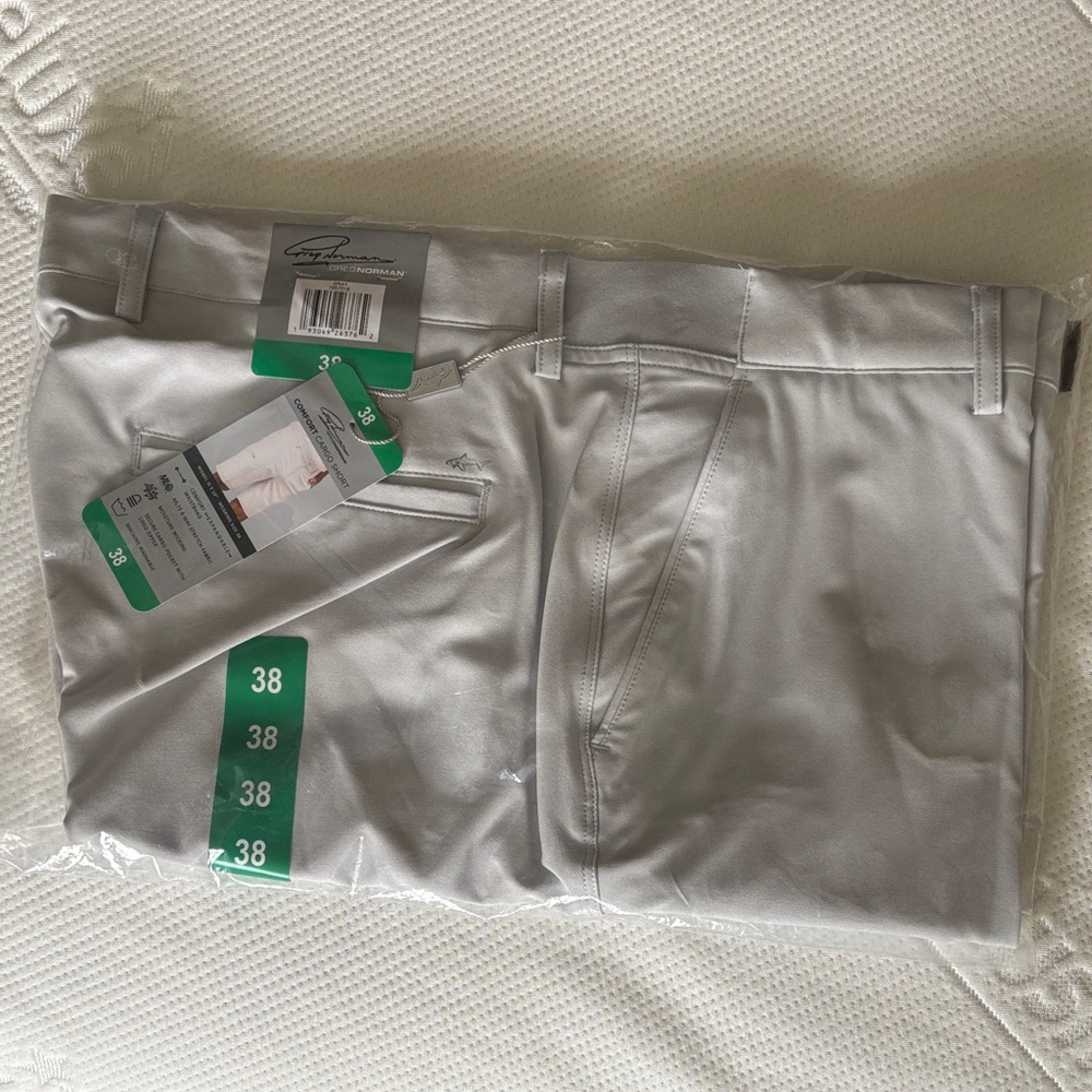 NWT unopened packaging 
Greg Norman Comfort Cargo Shorts Gray color, Size 38